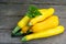 Heap of young yellow zucchini