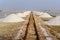 Heaps of salt along old narrow gauge railway on Sambhar Salt Lake. India