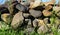 heaps of stones above the meadow during the day under a clear sky