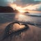 Heart arranged on the sand on the beach of small stones, sunset in the background. Heart as a symboaffection and love
