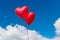 heart balloon against blue sky background