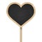 Heart blackboard standing on wooden post