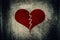 Heart broken painted on grunge cement wall background - love con