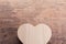 Heart brown wood box on wood background, abstract love