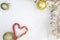 Heart candy cane, decoration balls, tinsel on white background.