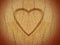 Heart carved on wood