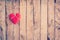 Heart fabric hanging on clothesline and wood background with spa