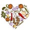 Heart floral design with colored onion, garlic, pepper, greenery, ginger, basil, rosemary