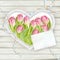 Heart frame with fresh tulips. EPS 10