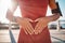 Heart hands, fitness runner and black woman by the sea with emoji hand sign for exercise. Workout, running training and