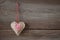 Heart hanging on wooden board