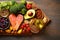 Heart-healthy eats, food on vintage boards for cholesterol diet concept