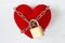 Heart locked with chain and padlock on white background - Concept of love