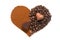 Heart made of ground coffee and coffee beans with chocolate hearts