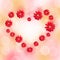 Heart made of red daisy gerbera flowers