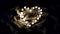 Heart made of small burning candles on sand at night, concept of love