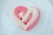 Heart meringues design by sugar in heart shape on plate for Homemade love in Valentine`s Day Decoration