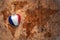 Heart with national flag of france on a vintage world map crack paper background