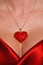 Heart necklace and red satin dress