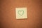 Heart note on cork board