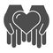 Heart in open hands solid icon. Love in arms vector illustration isolated on white. Help glyph style design, designed