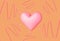 Heart on orange background with pointing curved arrows, love concept