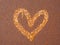 Heart painted on rusty surface. Corrosion of metal texture closeup. Heavily corroded metal sheet. Abstract art. Symbol