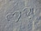 Heart and question symbols on the snow. Romantic sign silhouette on winter ground