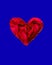 Heart of the red petals isolated on blue