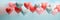 Heart shape balloons flying on blue sky. Valentines day banner. Pastel color ballons in the air