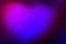 Heart shape. Black purple violet blue magenta pink abstract background. Neon. Color gradient. Dark. Light spot.