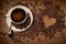 Heart shape from coffee beans on wood