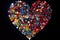 a heart shape created with multicolored marbles