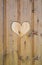 Heart shape cut on wooden wall, toilet, wc door