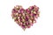 Heart shape dehydrated pink rose buds top down view isolated over white