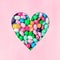 Heart shape filled with small colourful candies