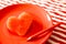 Heart shape fresh watermelon on red dish