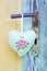 Heart shape hanging on rusty door handle for valentine, christma