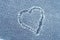 Heart shape on hoarfrost background