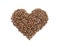 Heart shape made of coffee beans isolated