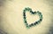 Heart shape made from marbles with vintage effect. valentines day concept or wedding concept. room for text.