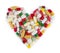 Heart shape made from medicine capsules, pills and tablets