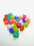 heart shape made of multi-colored gems