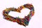 Heart shape made of multicolor wooden stiks