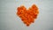 Heart shape orange cosmos flower