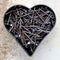 Heart shape with rusted nails