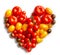 Heart shape by various tomatoes