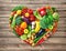 Heart shape by various vegetables and fruits