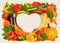 Heart shaped background made of vegetables and fruit.
