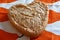 Heart shaped baked cake just cooling before frosting and decirating